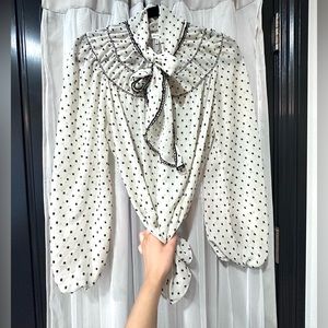 Black and white polkadot blouse